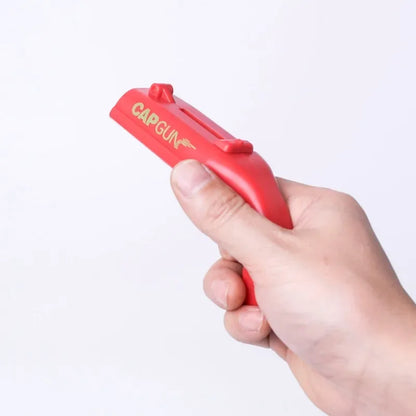 Cap Launching Bottle Opener
